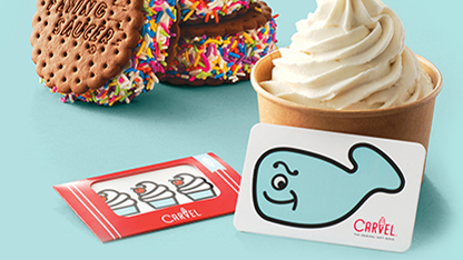 A whimsical scene featuring a cartoon fish on a business card and a frosted cupcake adorned with donuts and sprinkles. The backdrop is an unassuming, mint green.